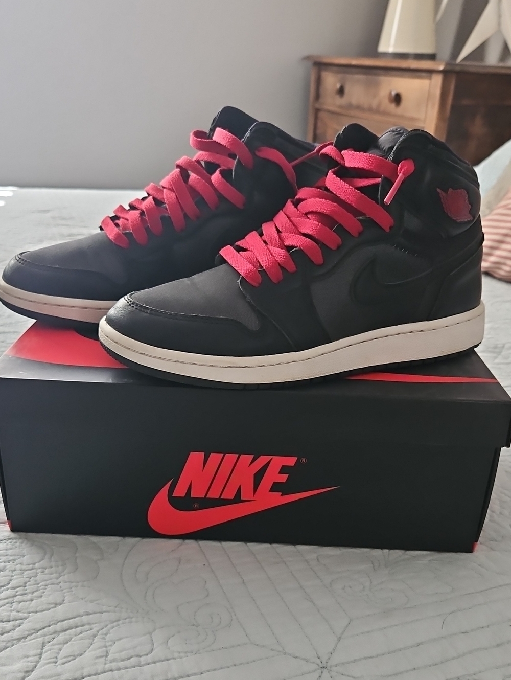 Nike Youth Black High-Top Sneakers with Red Accents